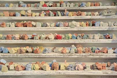 Sead Kazanxhiu, Shtëpizëzat (Tiny Houses), 2014. 2500 self-made plaster objects, 5x5cm each